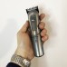 Бездротова машинка для стрижки волосся GEMEI GM-6112 акумуляторна, окантувальна машинка. Колір: сірий Бездротова машинка для стрижки волосся GEMEI GM-6112 акумуляторна, окантувальна машинка. Колір: сірий